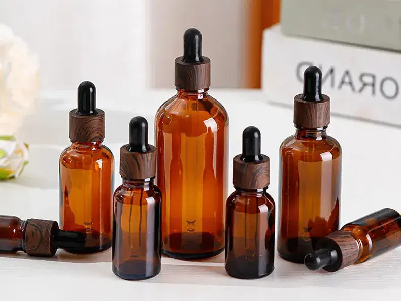 Amber and cobalt glass bottles with labels